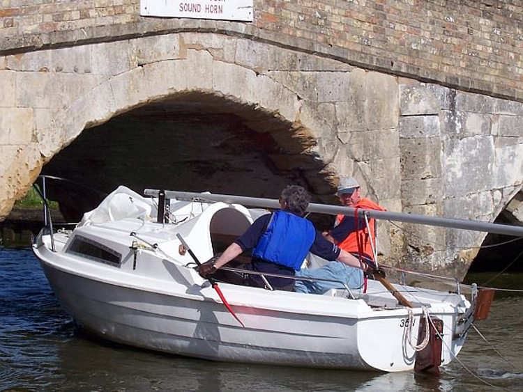 A SeaHawk passes under Potter Heigham Bridge